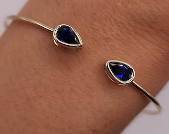 Bracciale rigido in oro 14 carati con zaffiri blu, bracciale con zaffiri, bracciale con castone a goccia, bracciale rigido aperto, bracciale flessibile, bracciale con pietra portafortuna di settembre