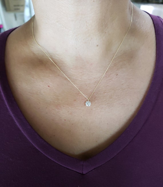 Diamond solitaire 1/2k necklace on a 14k gold chain. Moms gift for me ❤️  love the size. Swipe to see how it looks when worn! : r/Diamonds