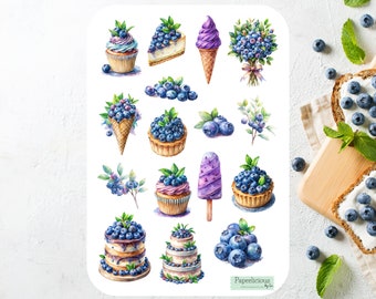 May include: A sheet of stickers featuring watercolor illustrations of blueberry-themed desserts and fruit. The stickers include cupcakes, cakes, ice cream cones, and blueberries. The sheet is titled "Paperlicious by Jen".