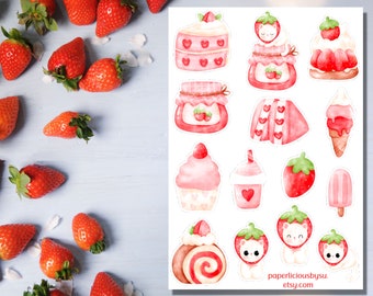 Può includere: Un foglio di adesivi a tema fragola con vari dessert e frutta. Gli adesivi includono fette di torta, barattoli di marmellata, gelati, cupcake e fragole. Gli adesivi sono in tonalità rosa e rosse, con uno stile acquerello. Fragole fresche sono sparse.