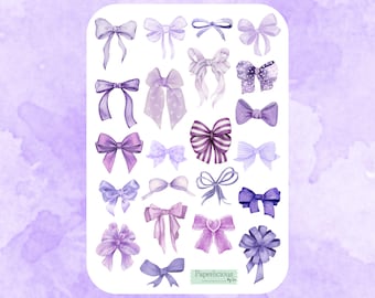 May include: A sheet of purple and white watercolor bow stickers. The bows are in various styles and sizes. The sheet is labeled "Paperlicious by Jen".