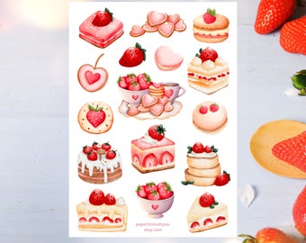 May include: A set of 18 watercolor stickers featuring pink and red strawberry and heart designs. The stickers include cakes, cupcakes, cookies, and hearts. The stickers are perfect for adding a touch of sweetness to your planner, journal, or scrapbook.