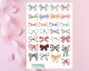 May include: A sheet of 25 watercolor bow stickers in various colors and patterns. The stickers feature a variety of bow styles, including classic, oversized, and ribbon bows. The stickers are perfect for adding a touch of whimsy to planners, journals, and other paper crafts.