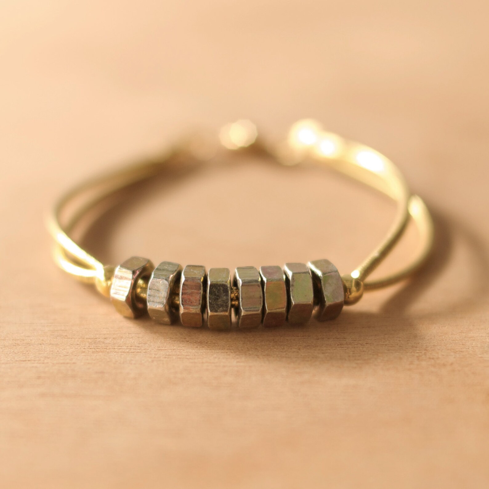 Handmade hex nut with gold rubber thread bracelet Etsy