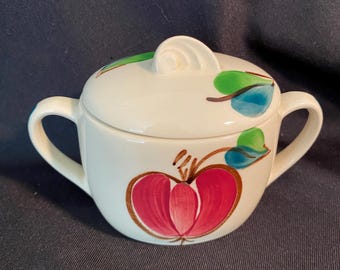 Azucarero vintage con forma de manzana y tapa.