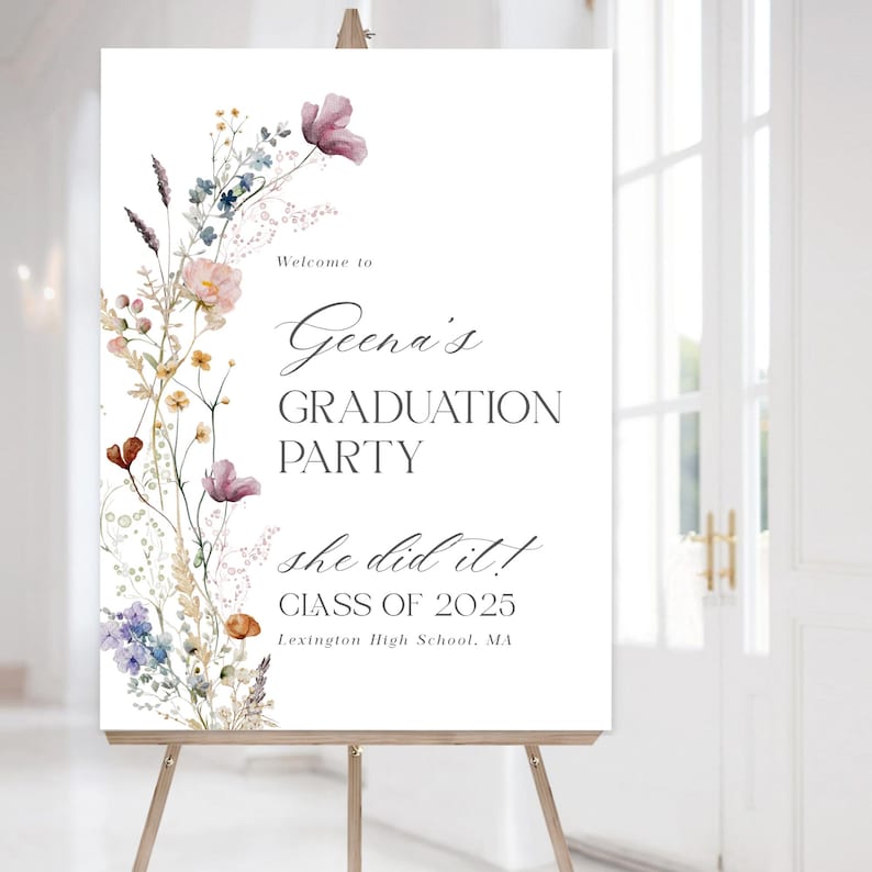 May include: A white sign with a floral border and the text "Welcome to Geena's Graduation Party she did it! Class of 2025 Lexington High School, MA"