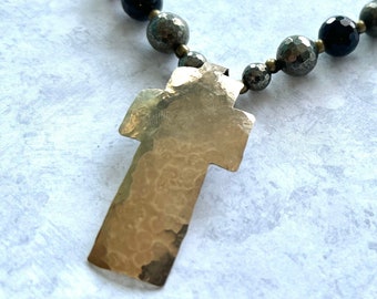 Brass hammered cross on natural leather with onyx and pyrite