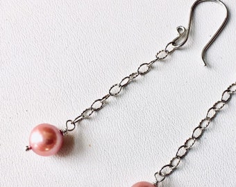 Simple, swinging dangles with rosy pink colored freshwater pearls on 935 silver