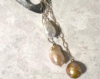 Bold, contemporary hammered silver and pearl drop necklace