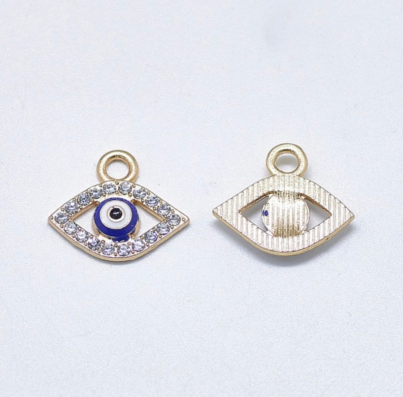One blue enamel and crystal rhinestone light gold plated evil eye charm pendant for jewellery making