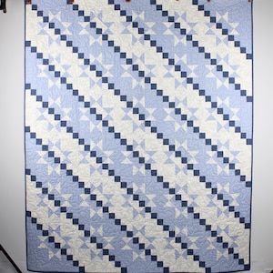 Patchwork Star Throw Quilt in Blue and Cream with Navy Chains