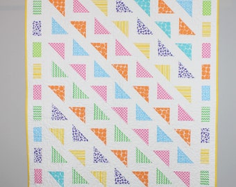 Handmade Baby Quilt/ Lap Quilt with Multi Color Triangles on White Background