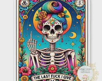 May include: A colorful tarot card illustration featuring a skeleton with a rainbow-colored hairstyle, floral accents, and a middle finger gesture. The card has a blue background with stars and a crescent moon. The text reads "THE LAST FUCK I GIVE."