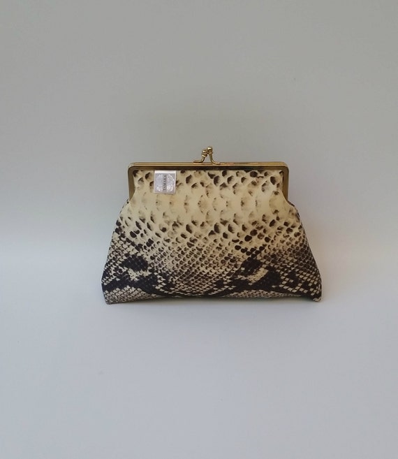 snakeskin clutch