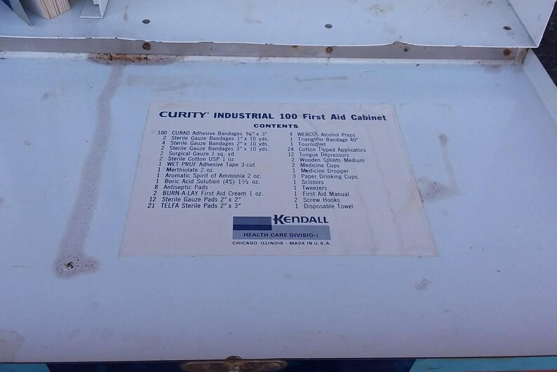 Curity first aid cabinet vintage nurse kit industrial 100 blue white wall hanger metal 1950s Chicago made in USA home decor shelf