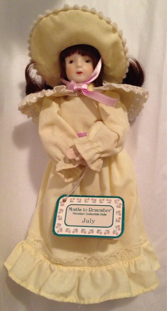 months to remember porcelain collectible dolls