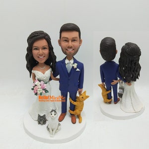 Custom Couple Bobblehead Wedding Cake Topper with Dogs