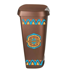 May include: A brown trash can with a geometric pattern in blue, orange, and yellow. The pattern features a repeating wave design and a central geometric shape.