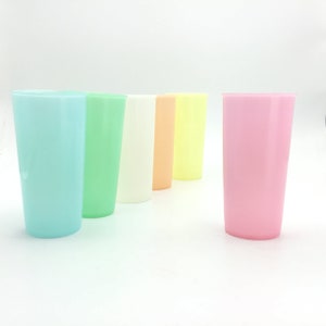 May include: Set of six plastic cups in various pastel colors, including light blue, green, white, peach, yellow, and pink.