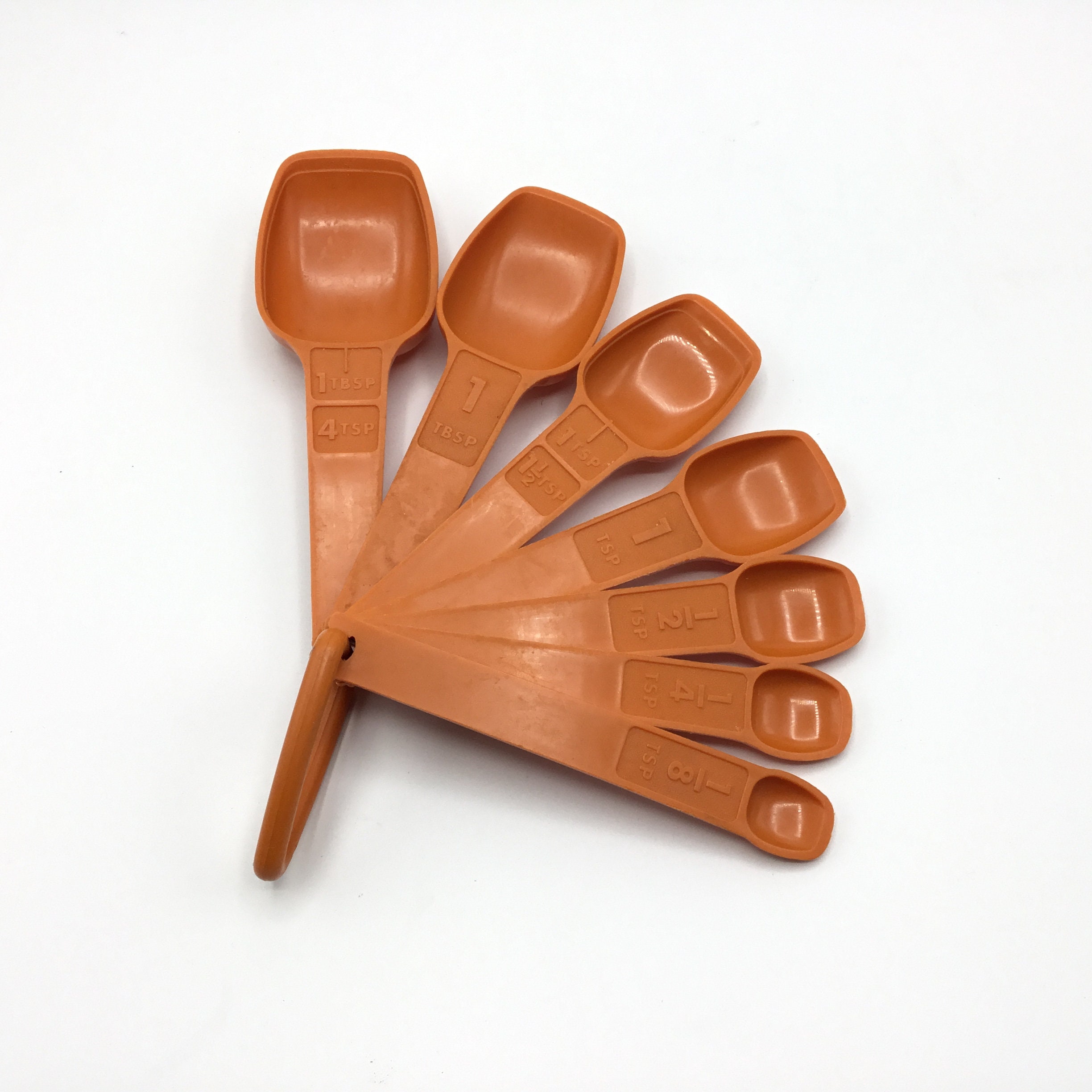 Orange Tupperware Measuring Spoons 
