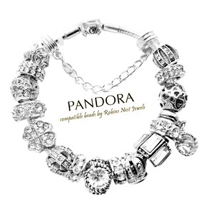 Pandora Bracelet With Pink Blue and Black Themed Charms 