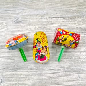 Vintage Collection of 3 Tin Litho Noisemakers US Metal Toy Mfg Co - Jester Couple Red Yellow Party