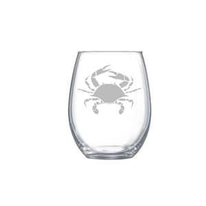 May include: A clear glass stemless wine glass with an etched design of a crab.