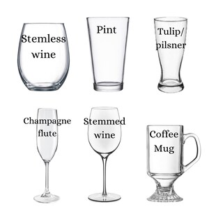 May include: A set of six different glass drinking vessels, including a stemless wine glass, a pint glass, a tulip/pilsner glass, a champagne flute, a stemmed wine glass, and a coffee mug.