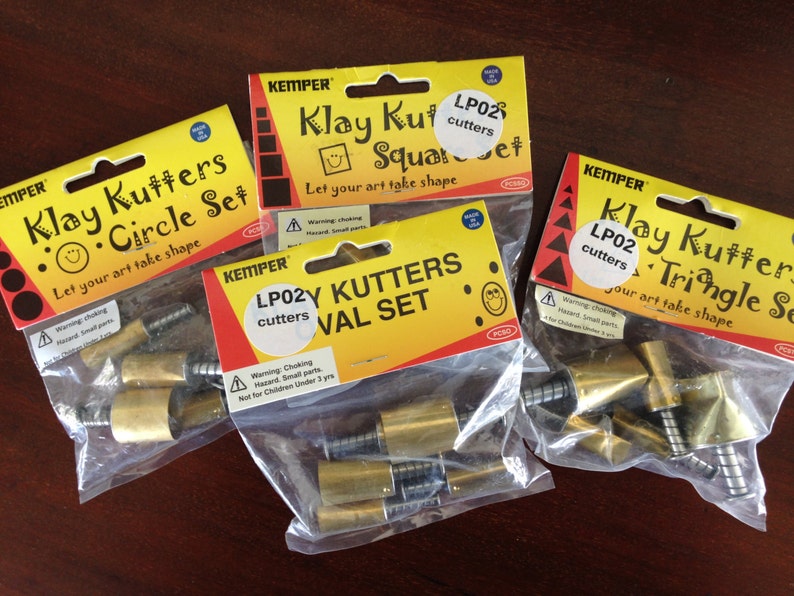 Plunge style cutters by Kemper 76 Piece teardrop triangles and more Klay Kutters square stars round