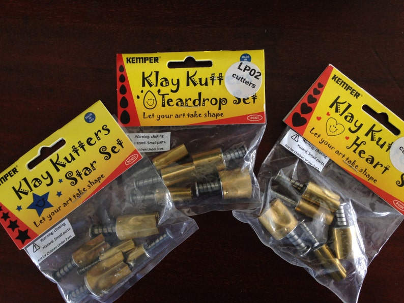 Plunge style cutters by Kemper 76 Piece teardrop triangles and more Klay Kutters square stars round