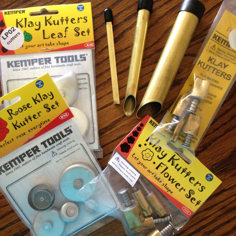 Plunge style cutters by Kemper 76 Piece teardrop triangles and more Klay Kutters square stars round
