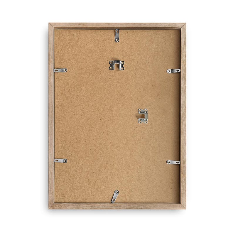 May include: A rectangular picture frame shown from the back, featuring a light brown wooden border and a tan fiberboard backing. The frame includes several silver metal swivel clips along the edges and two metal hangers for wall mounting.