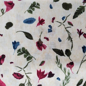 100% quilting cotton fabric, Hoffman.   PRICED by the 1/2 yard. Scattered flower petals and parts on creamy pale tan yellow background.