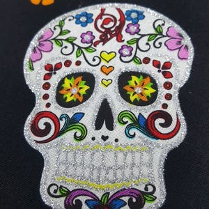 Sold by the FAT 1/4. Approximately 18” x 21&quot;.  100% cotton, skulls Dia de los muertos, silver highlights, day of the dead Folklorico Black
