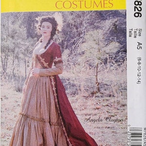 May include: A sewing pattern for a historical costume, featuring a woman wearing a long, burgundy dress with a brown skirt and a lace trim. The pattern is for sizes 6-8-10-12-14 and is called McCall's Costumes M7826.