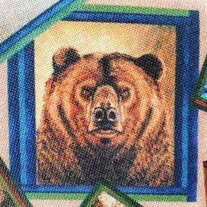 100% cotton Quilting fabric stunning tossed framed American wild wildlife animals, bear, eagle, deer, wolf, duck, loon, elk, on Golden tan