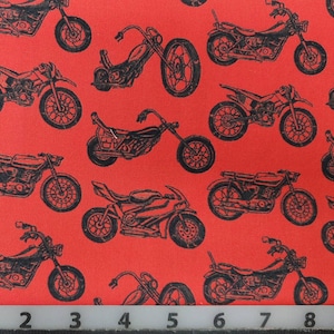 100% cotton Quilting fabric by the motorcycle 1/2 yard, cut to order.   bike  motorcycles on Crayola red background .   Bikes about 3.25&quot;
