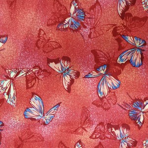 100% quilting cotton,   PRICED by the half 1/2 yard. Mottled Crayola red with colorful butterfly butterflies scattered all over.  RD