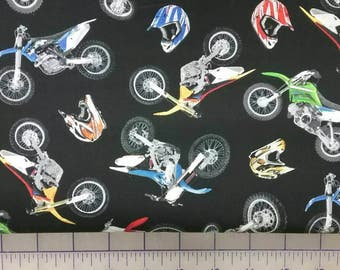 100% cotton Quilting fabric the motocross 1/2 yard, cut to order.    dirt bike  motorcycle black background .   Bikes about 3.25&quot;