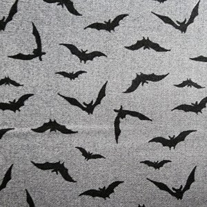 100% cotton Quilting fabric.  PRICED by the 1/2 yard and cut on order.  Spooky Halloween bat bats vampire, fun. Black on medium grey gray