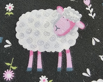 Cute Black background with white & pink sheep tossed allover. 100% cotton Quilting fabric.  PRICED by the 1/2 yard cut on order.