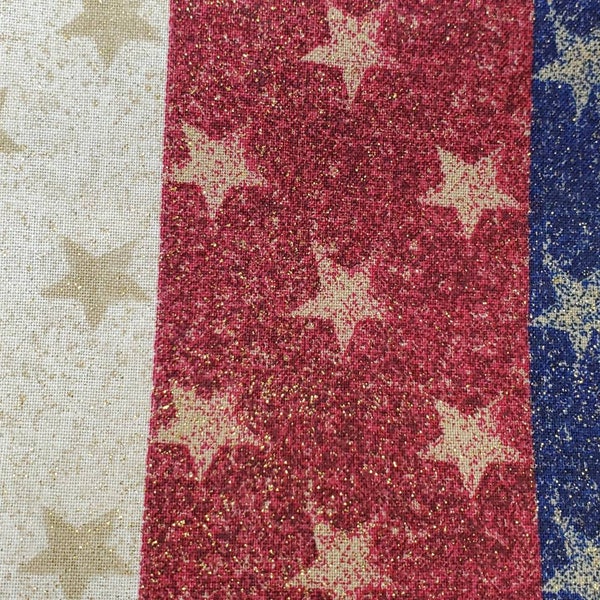 100% cotton fabric PRICED by the 1/2 yard. Patriotic Americana Red cream blue stars and stripes with gold glitter scattered