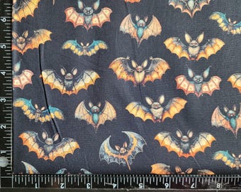Super cute bats bat directional print on black. 100% cotton Quilting fabric PRICED by the 1/2 yard, cut on order.  Quilting Treasures