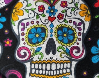 Sold by the FAT 1/4. Approximately 18” x 21”.  100% cotton fabric. Black background, bright bold sugar skulls. Day of the dead.