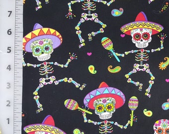 100% cotton Quilting fabric.  Priced by the 1/2 yard, cut to order. Bright day of the dead dia de los muertos skeletons skulls bones dancing
