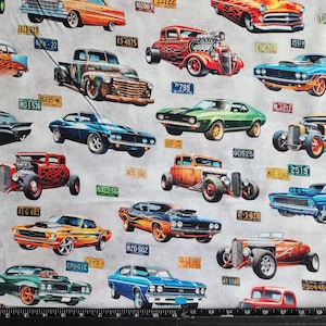 100% cotton Quilting fabric. PRICED by the 1/2 yard, cut on order. Cars, classic, rods, muscle, oldies, on grey background, large size print