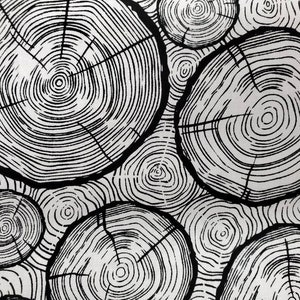 100% quilting cotton,   PRICED by the 1/2 yard. Black and white wood timber boards tree rings all over.
