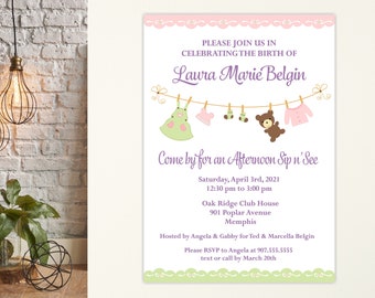 May include: A pink and green baby shower invitation with a purple banner that says "Please join us in celebrating the birth of Laura Marie Belgin". The invitation features a clothesline with baby clothes and a teddy bear hanging from it. The invitation also includes the date, time, and location of the baby shower.