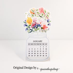 Calendario de escritorio con ramo floral 2026: arreglo de flores silvestres