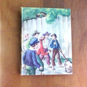 Book, The Adventures of Tom Sawyer 1946 publication by Mark Twain and very nice illustrations by Donald McKay